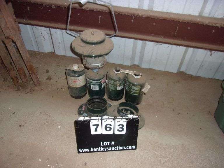 COLEMAN HEAT LAMP & 4BUTANE/PROPANE BOTTLES Bentley & Associates, LLC