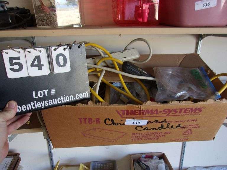 BOX ASSORTED CHRISTMAS DÉCOR, CANDLES, SURGE PROTECTORS Bentley & Associates, LLC