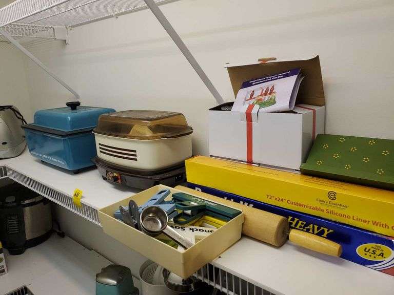 Nesco 4 QT roaster oven, West Bend slow cooker, rolling pin foil