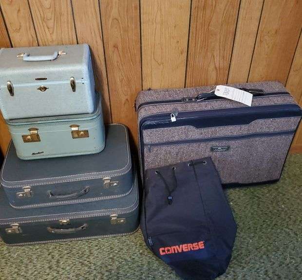 Group of hard shell and soft shell suitcases including , Jordache