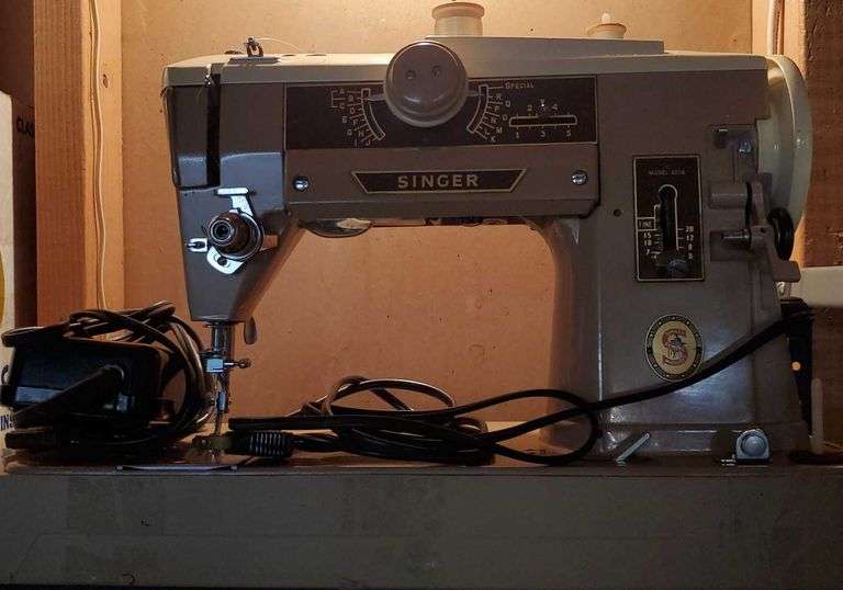 Singer portable electric sewing machine with case Model 401a. Sewing