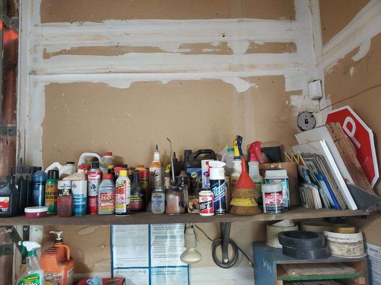 Contents of shelf hydraulic oil, brake cleaner, PB Blaster, stop leak
