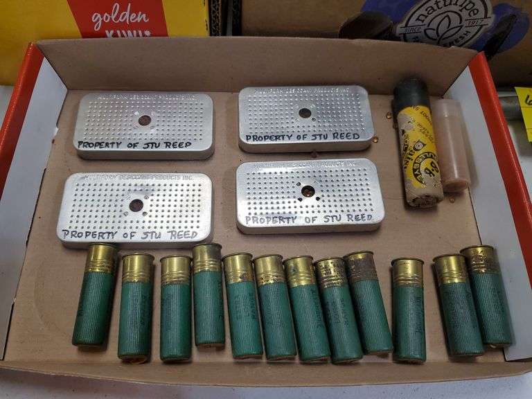 Twelve 16 gauge shotgun shells, 4 dessiccant cartridge dry pack cases
