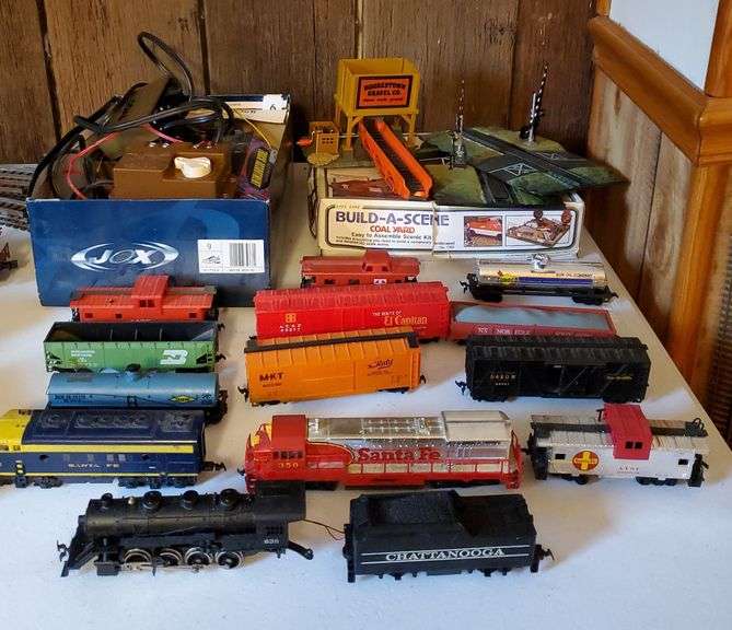 HO trains cars, track, transformers, coal yard. See all pictures Bid