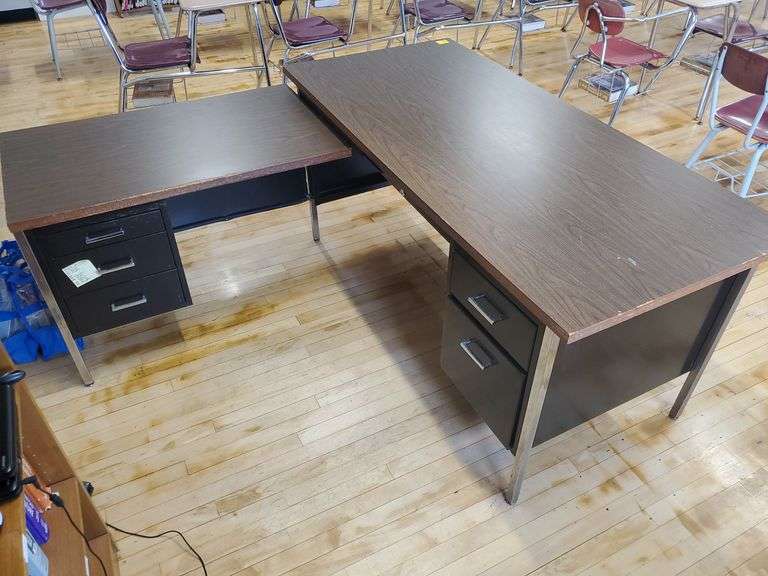 30x66 single pedestal metal teacher desk with 24x 40 side return. Room