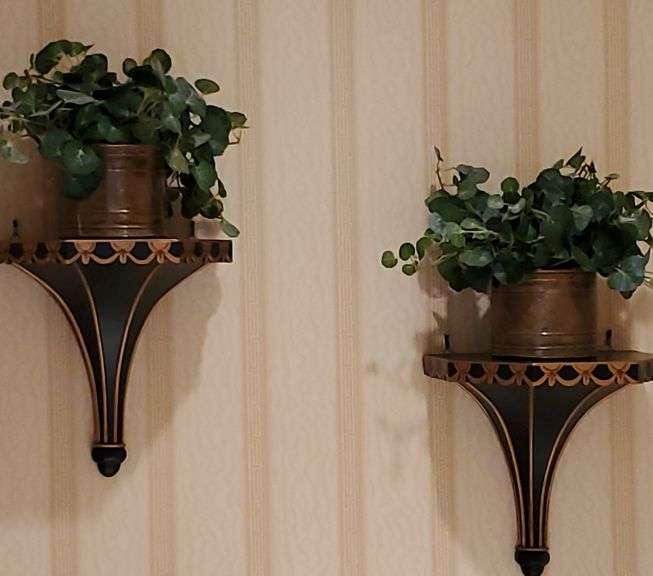 Pair of wall sconces with artificial greenery... Master bathroom Bid