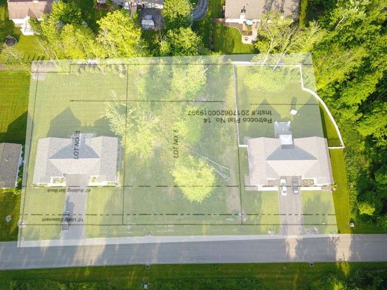 Building lot number 5 Multi family zoned building lot. There are