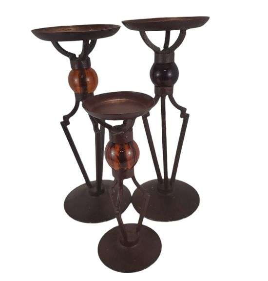 Pier 1 candlesticks one appears to have darker glass 13.5 in and 10 in