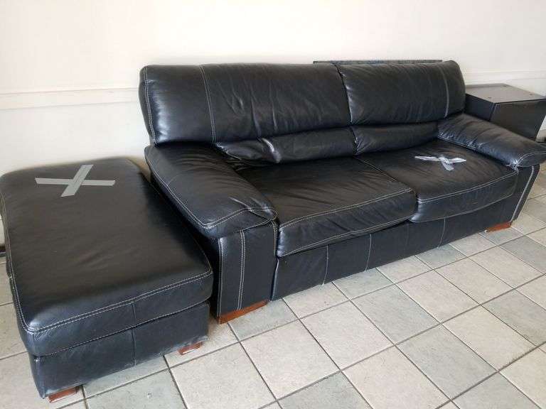91 in two cushion black leather sofa with white stitching including