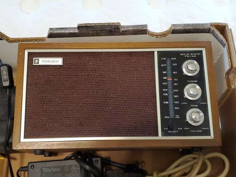 Box of assorted electronics including multi outlets, computer speakers