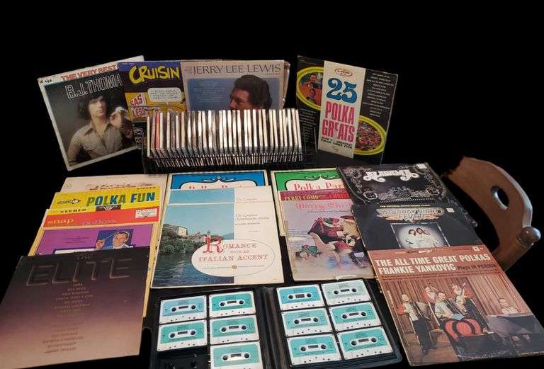 Large group of music related items including "100 Greatest Hits "Rock and Roll cassettes... CDs ...