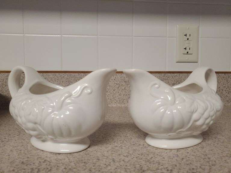 Pair of white table tops Gallery Harvest gravy boats. BidAssets