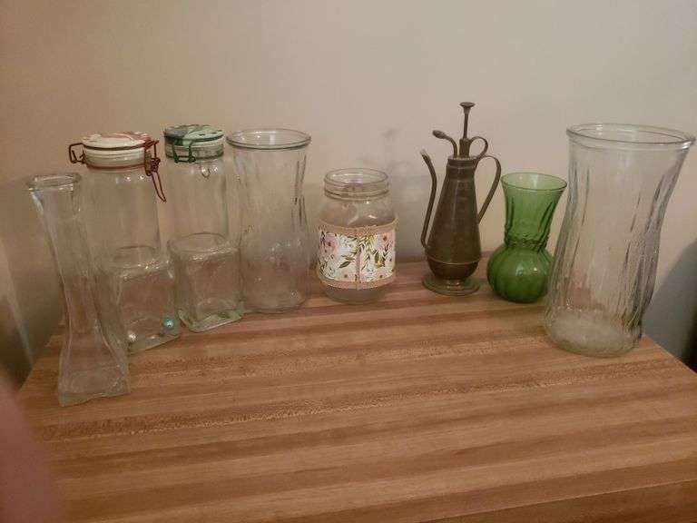 Group including plant sprayer, glass vases and containers BidAssets