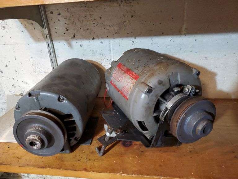 Two used electric motors. One marked Dayton one quarter horsepower