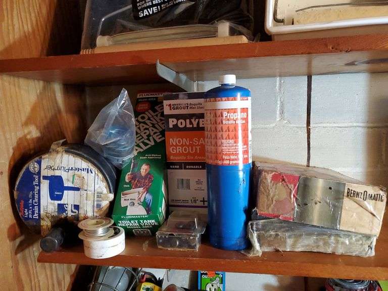 Two drain snakes, fluid Master toilet tank repair valve, bernzomatic