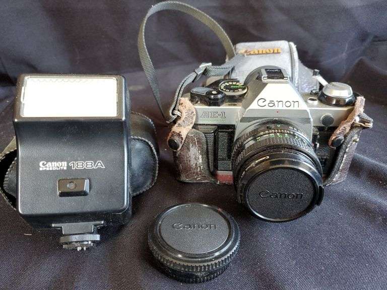 Canon AE1 Program camera with case and bag, Canon speed light 188A