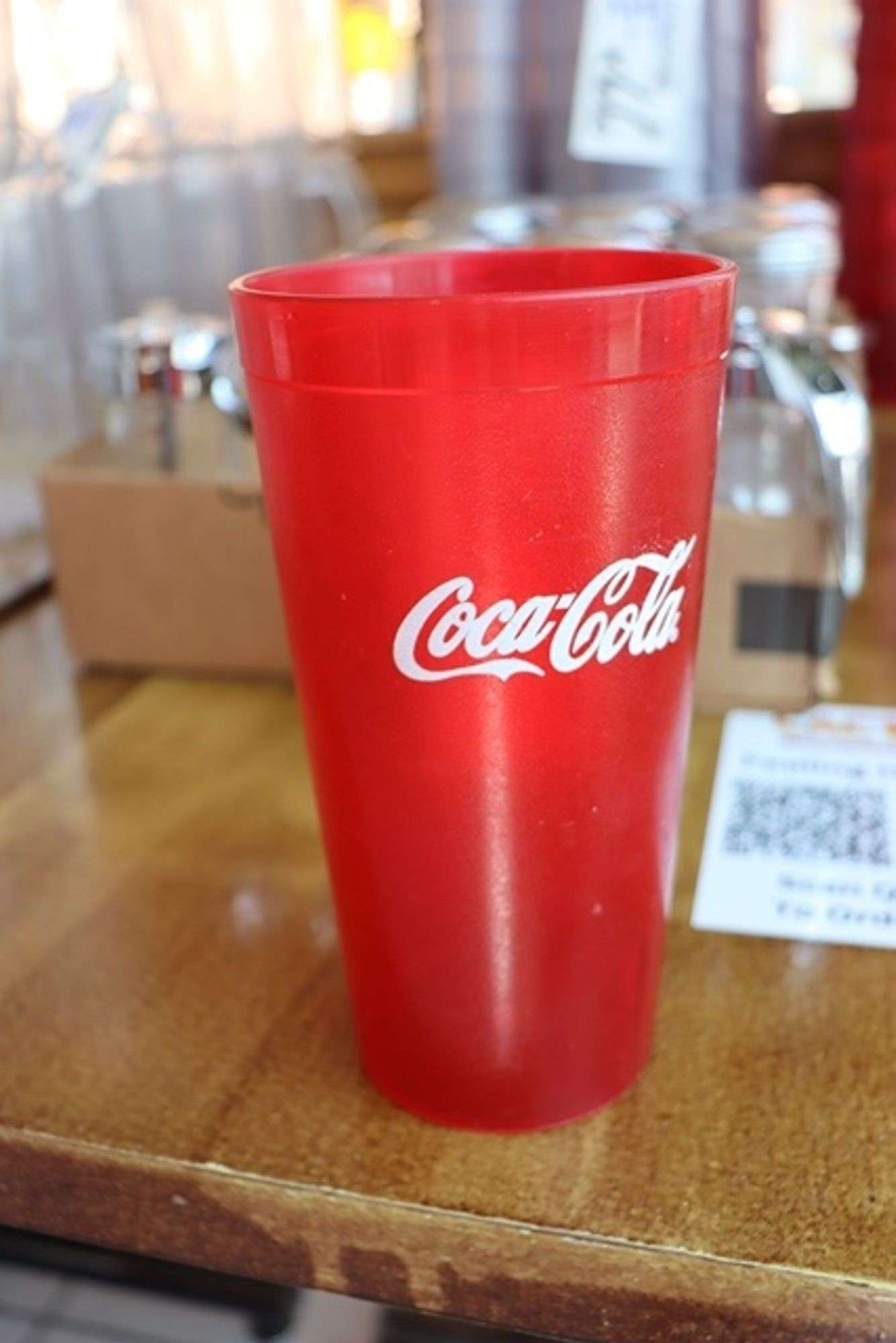 Times 76 - Impact 20 oz. red Coca-Cola labeled glasses - Backes