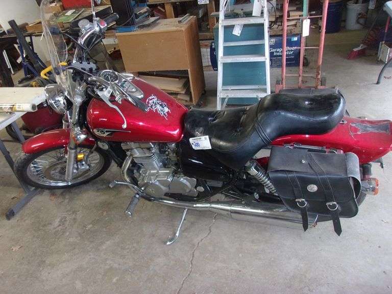 2006 Kawasaki 500cc Vulcan motorcycle, 11,000 miles, good rubber, runs good, dent in gas tank