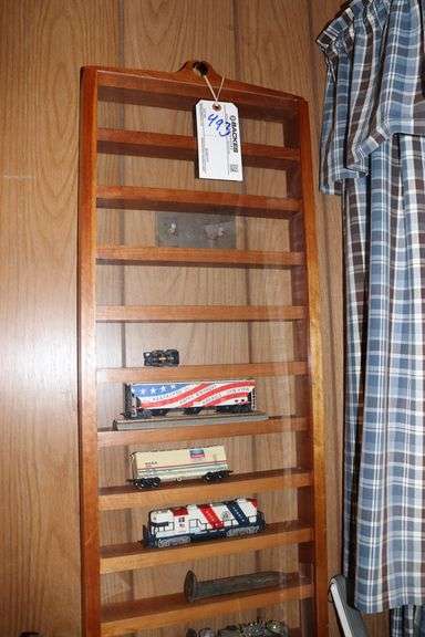 Train display rack with locomotive and cars - Backes Commercial Auctioneers