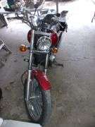 2006 Kawasaki 500cc Vulcan motorcycle, 11,000 miles, good rubber, runs good, dent in gas tank