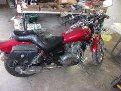 2006 Kawasaki 500cc Vulcan motorcycle, 11,000 miles, good rubber, runs good, dent in gas tank