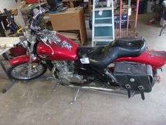 2006 Kawasaki 500cc Vulcan motorcycle, 11,000 miles, good rubber, runs good, dent in gas tank