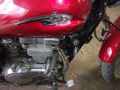 2006 Kawasaki 500cc Vulcan motorcycle, 11,000 miles, good rubber, runs good, dent in gas tank
