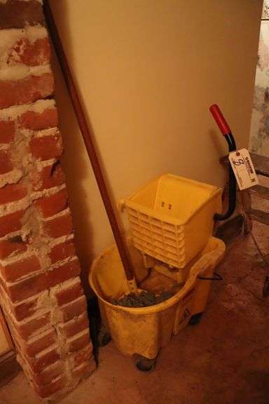 Rubbermaid mop bucket - located in basement