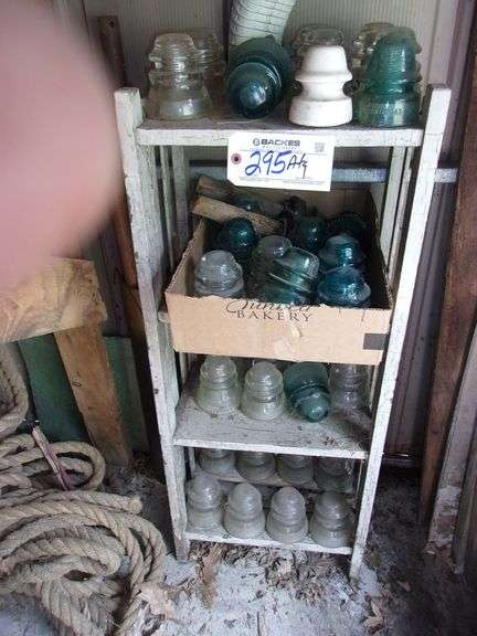 Primitive bookcase and insulators