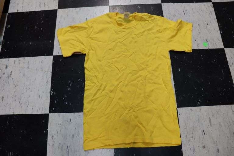 3 boxes to go - Assorted size & brand of yellow colored T-shirts