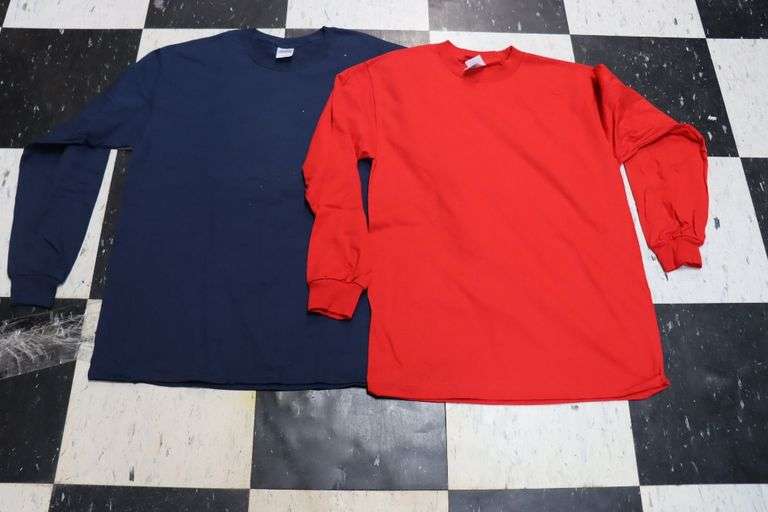 2 boxes to go - Assorted size & brand of red & navy T-shirts