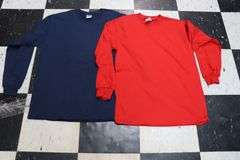 2 boxes to go - Assorted size & brand of red & navy T-shirts