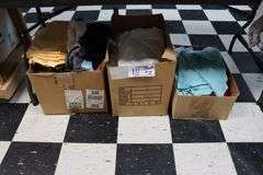 3 boxes to go - Assorted size, brand, & color of women's T-shirts