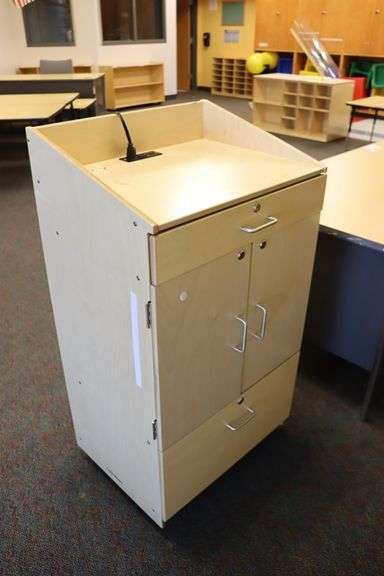 24" x 45" tall natural wood tone finish podium with power cord - portable