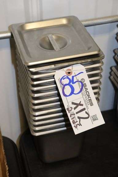 Times 12 - 1/6 x 6" stainless inset pans with 2 lids