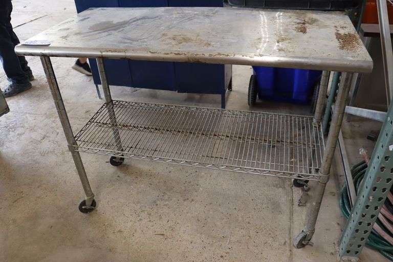 24" x 50" stainless portable table with wire under shelf