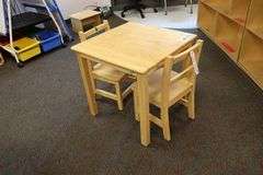 24" x 24" x 23" tall natural wood tone table with 2 matching chairs