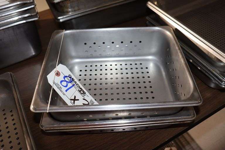 Times 3 - 2) 1/2 x 2" & 1) 1/2 x 4" perforated stainless inset pans - no lids