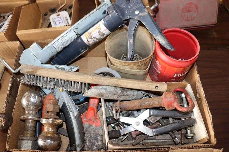 Box flat to go - caulk guns, knives, ball hitches, & more