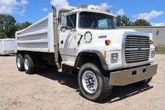 1995 Ford LT9000 tandem axle dump truck, 18k# front axles, 40K# rear axles, 3176 Cat motor, Eaton 10 spd trans, Chief 16' steel box, 553,340 miles, 385/65R22.5 steer tires, 11R/22.5 rear tires, good rubber, rear inner tire off bead, Vin # 1FDZU90S8SVA71756