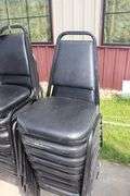 Times 24 - Black metal framed black vinyl seat & back padded stack chairs - minor rips & knicks on edges - overall good looking chairs