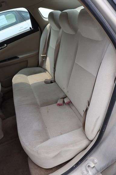 2010 Chevy Impala LT 4 door sedan, tan color, paint fading, 3500 V-6 motor, 219,133 miles, cracked winshield, door dents, Vin # 2G1WB5EKOA1189467. Buying Where Is-As-Is. No warranty or refunds.