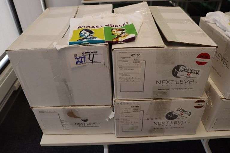 4 boxes to go - White bad ass nurse shirts
