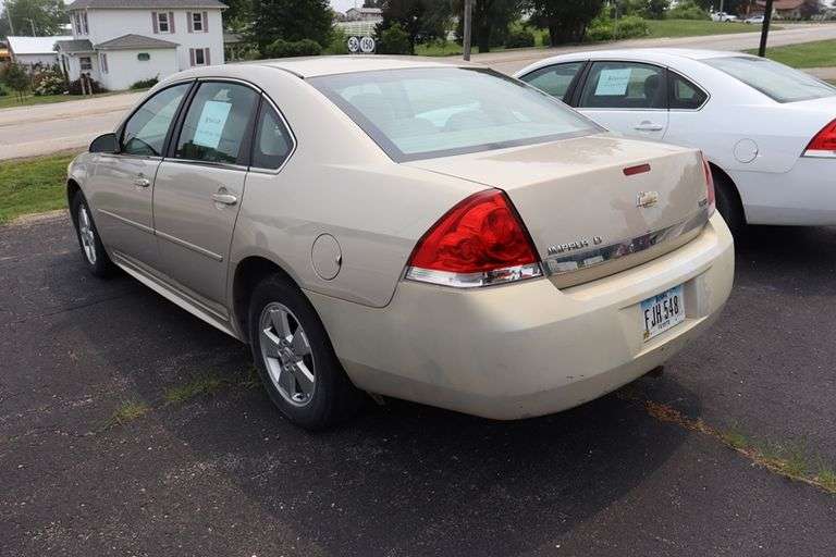 2010 Chevy Impala LT 4 door sedan, tan color, paint fading, 3500 V-6 motor, 219,133 miles, cracked winshield, door dents, Vin # 2G1WB5EKOA1189467. Buying Where Is-As-Is. No warranty or refunds.