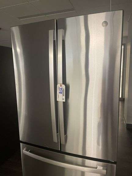 GE GNE27JYMKFFS stainless 2 door top mount refrigerator - nice  - doors will most likely have to be taken off to remove