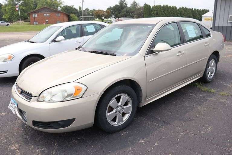 2010 Chevy Impala LT 4 door sedan, tan color, paint fading, 3500 V-6 motor, 219,133 miles, cracked winshield, door dents, Vin # 2G1WB5EKOA1189467. Buying Where Is-As-Is. No warranty or refunds.