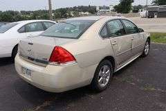 2010 Chevy Impala LT 4 door sedan, tan color, paint fading, 3500 V-6 motor, 219,133 miles, cracked winshield, door dents, Vin # 2G1WB5EKOA1189467. Buying Where Is-As-Is. No warranty or refunds.