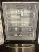GE GNE27JYMKFFS stainless 2 door top mount refrigerator - nice  - doors will most likely have to be taken off to remove