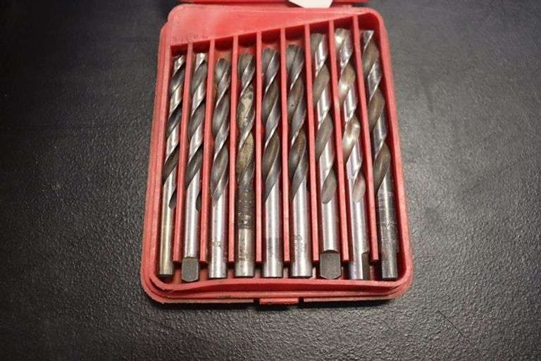 Set of Allied drill bits in case Backes Commercial Auctioneers