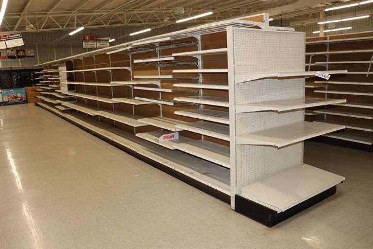 Times 100 Feet of Lozier island shelving, 84" tall with 22" decks